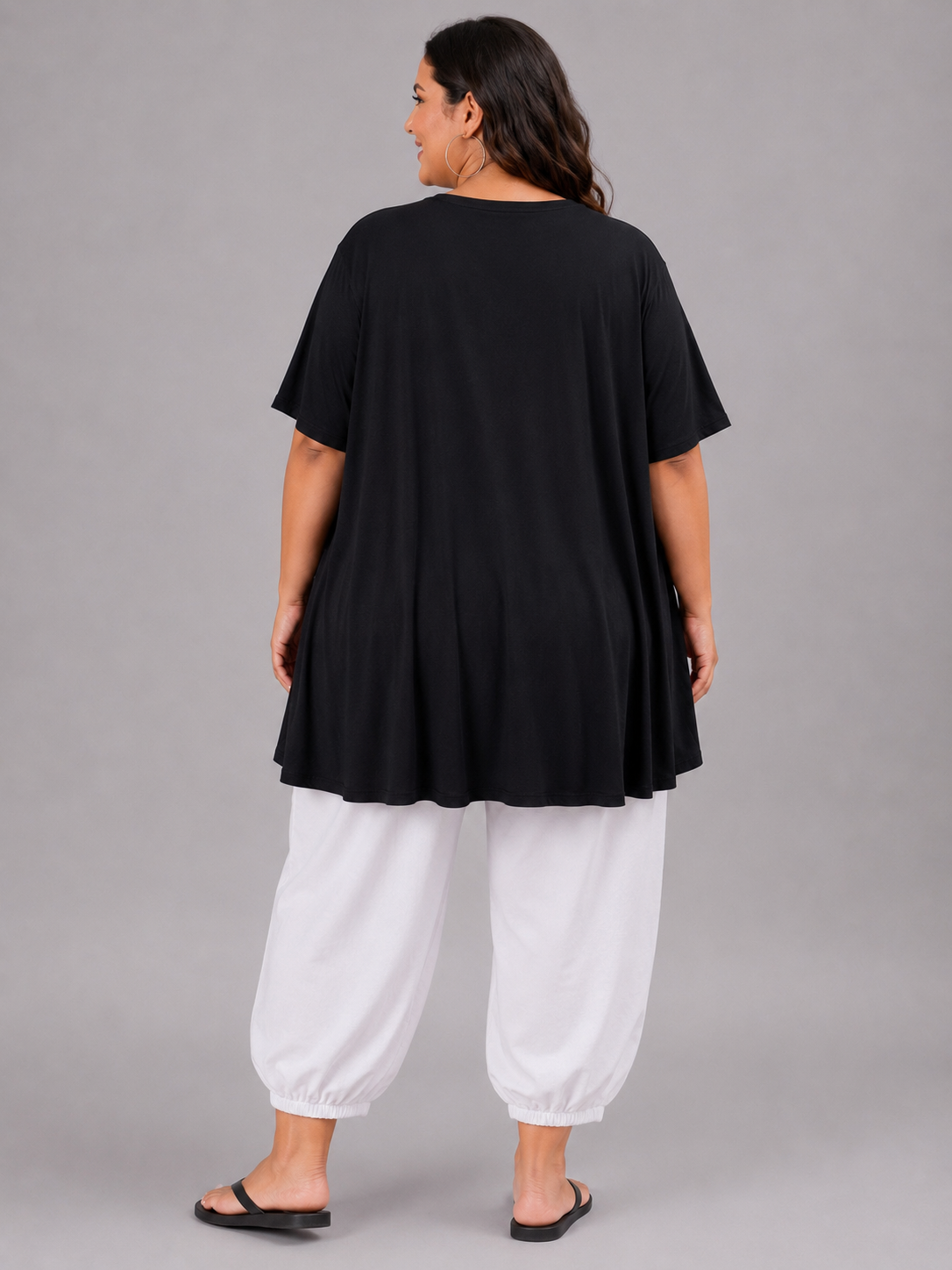 Frenzi Oversize Shirt Giraffe mit Blume Schwarz – Exklusiv-Print – Einheitsgröße 44–58