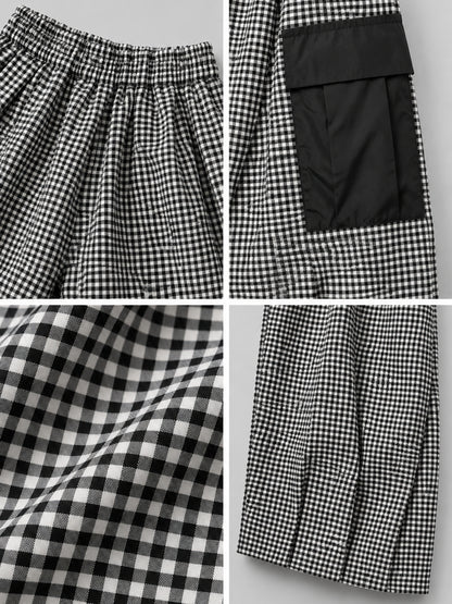 Elastischer Bund, Cargotasche mit Klappe, Karostoff und Beinabschluss der Ballonhose, Detailansicht