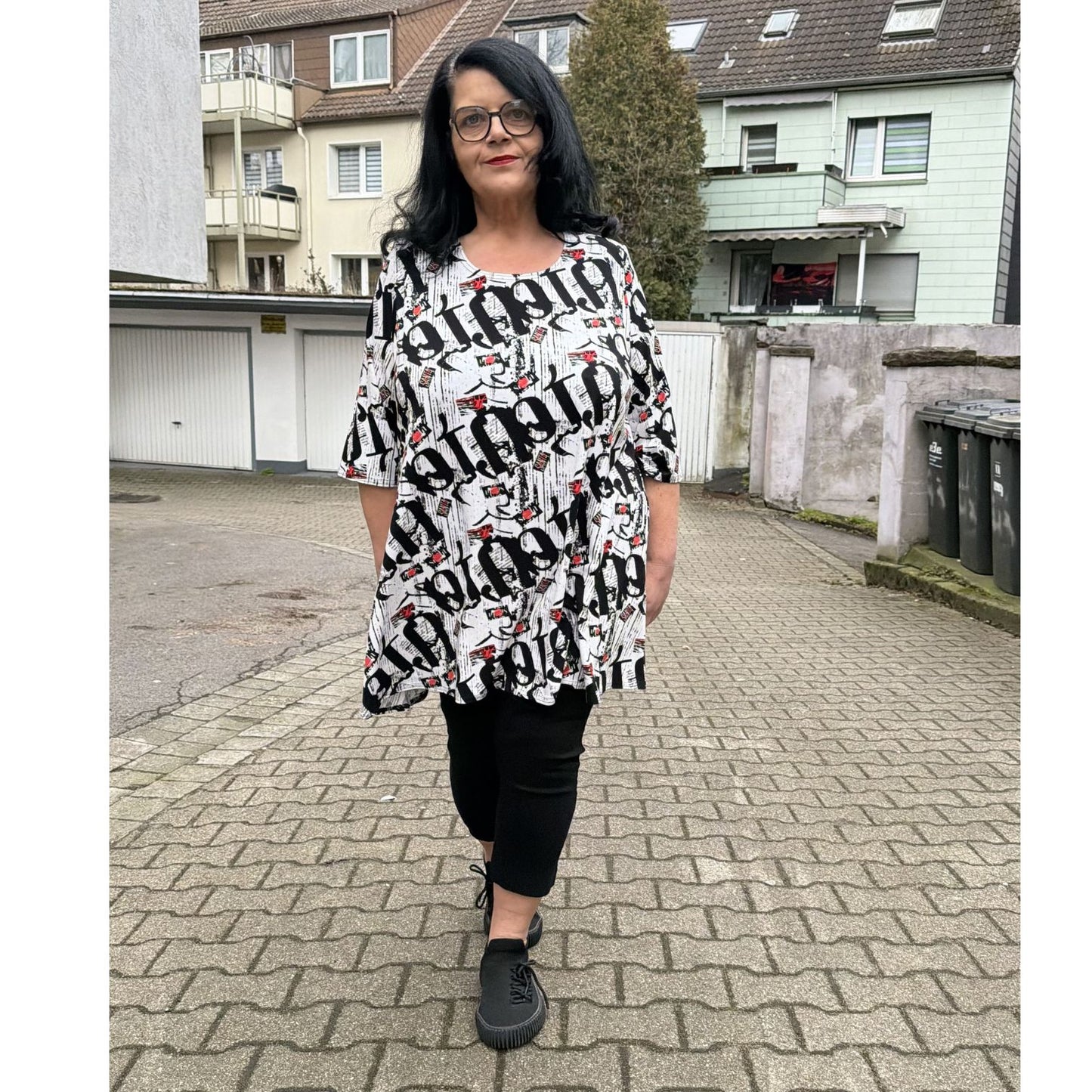 Naveed Tunika Schwarz-Weiß Print A-Linie mit Taschen